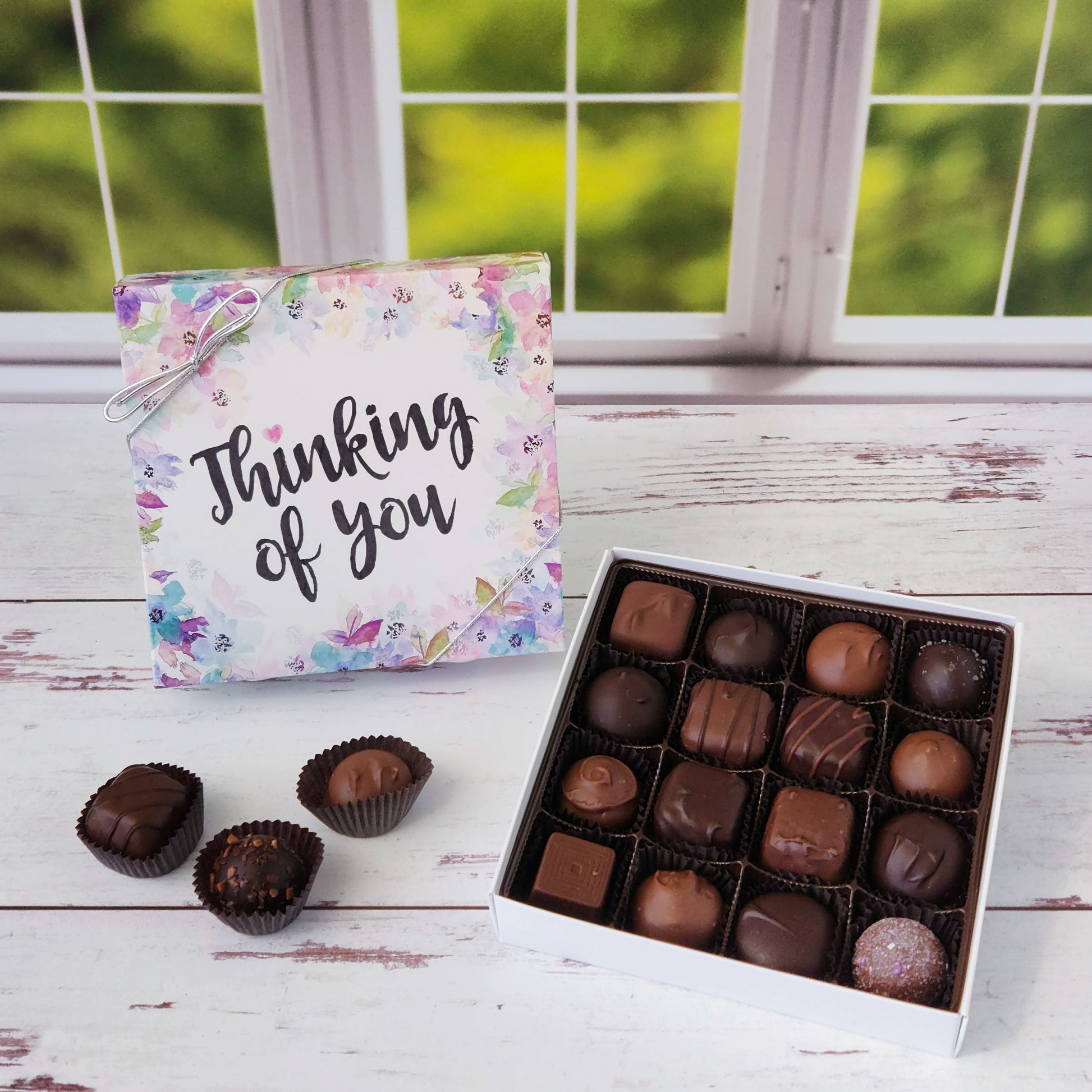 Delight someone special with our Floral Thinking of You assortment box - a thoughtfully curated mix of creams, caramels, melt‑aways, and truffles in milk and dark chocolate.
16 Piece box