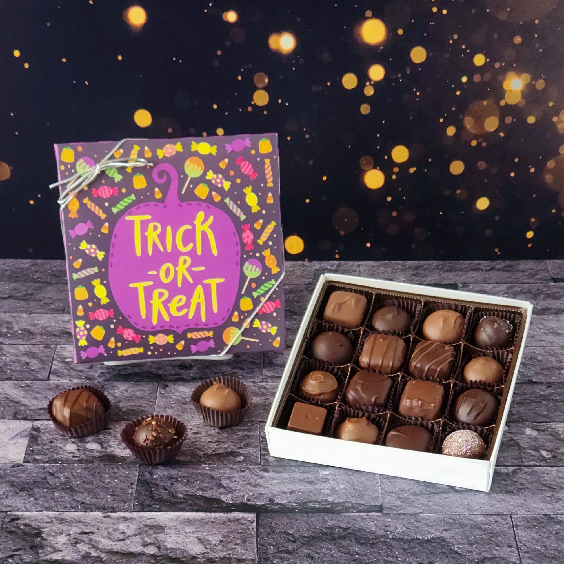 Enjoy a spellbinding variety of truffles, creams, caramels, and meltaways with our trick or treat milk and dark chocolate assortment box.  
16 piece box