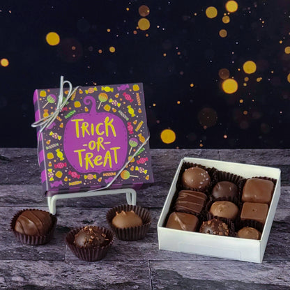 Enjoy a spellbinding variety of truffles, creams, caramels, and meltaways with our trick or treat milk and dark chocolate assortment box.  
9 piece box