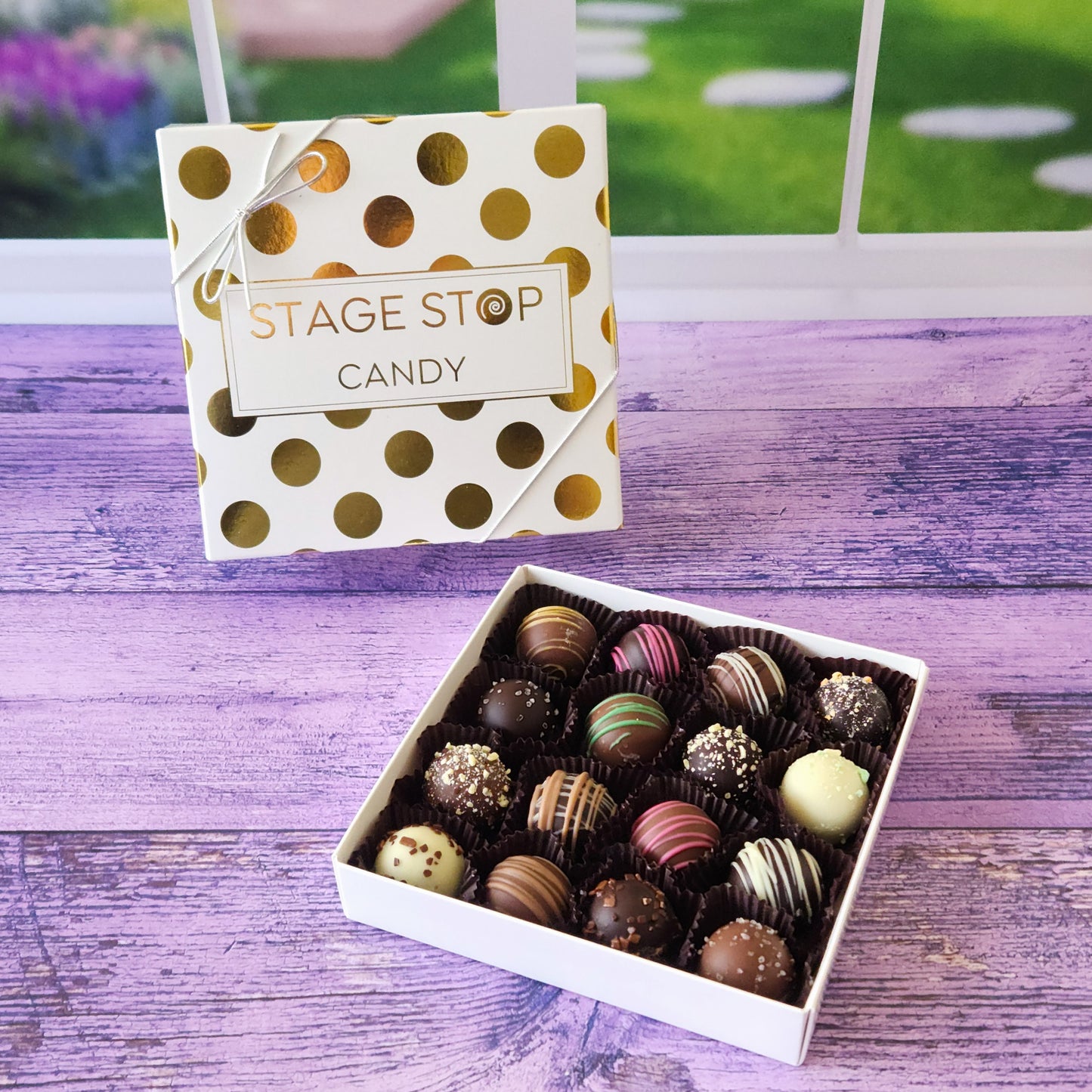 Our 16 piece truffle assortment is a fan favorite! Our truffles are filled with rich, velvety mixture of chocolate, heavy cream, and award-winning flavors! The ganache center is double coated with chocolate and hand decorated.