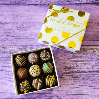 Our 9 Piece truffle assortment is a fan favorite! Our truffles are filled with rich, velvety mixture of chocolate, heavy cream, and award-winning flavors! The ganache center is double coated with chocolate and hand decorated.