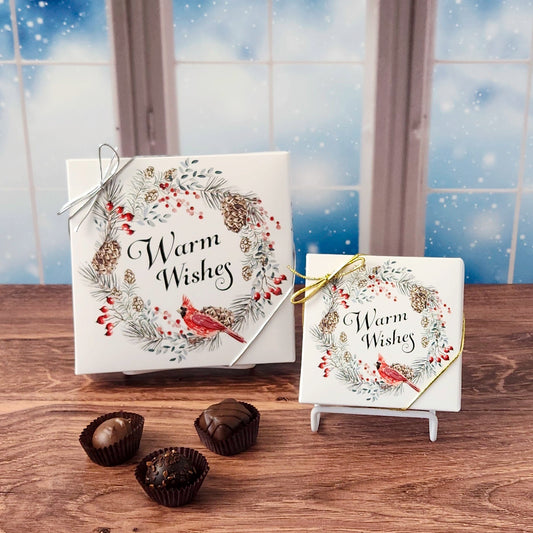 Warm Wishes Cardinal Chocolate Box.  A beautiful assortment of our most popular milk and dark chocolates, available in your choice of a 9 or 16 piece box.   Inside, you’ll discover a handcrafted variety of gooey caramels, rich truffles, creamy centers, and smooth melt-aways.