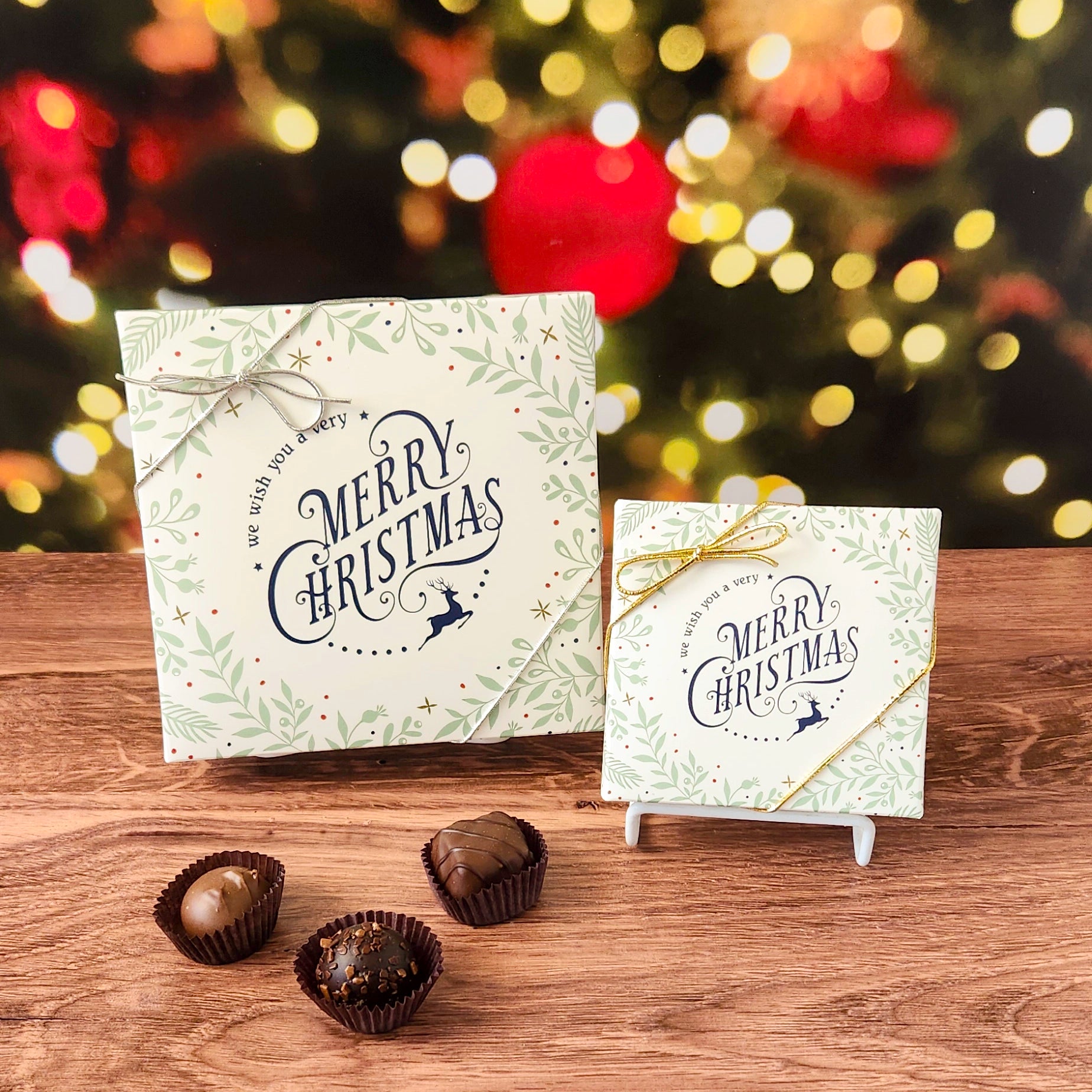 We Wish You a Merry Christmas Holiday Chocolate Assortment.  This decorative box is filled with some of our most beloved milk and dark chocolates.  From smooth, silky creams to gooey caramels, dreamy melt-aways, and rich truffles that melt in your mouth.  Available in 9 or 16 pieces.
