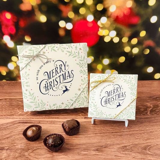 We Wish You a Merry Christmas Holiday Chocolate Assortment.  This decorative box is filled with some of our most beloved milk and dark chocolates.  From smooth, silky creams to gooey caramels, dreamy melt-aways, and rich truffles that melt in your mouth.  Available in 9 or 16 pieces.