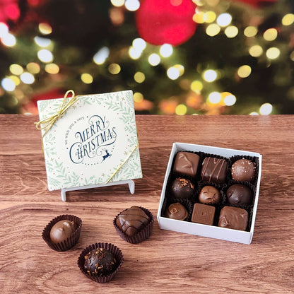 We Wish You a Merry Christmas 9 Piece Chocolate Assortment.  Inside, you'll find a handpicked assortment of our most popular milk and dark chocolates. Think creamy centers, buttery caramels, dreamy melt-aways, and decadent truffles