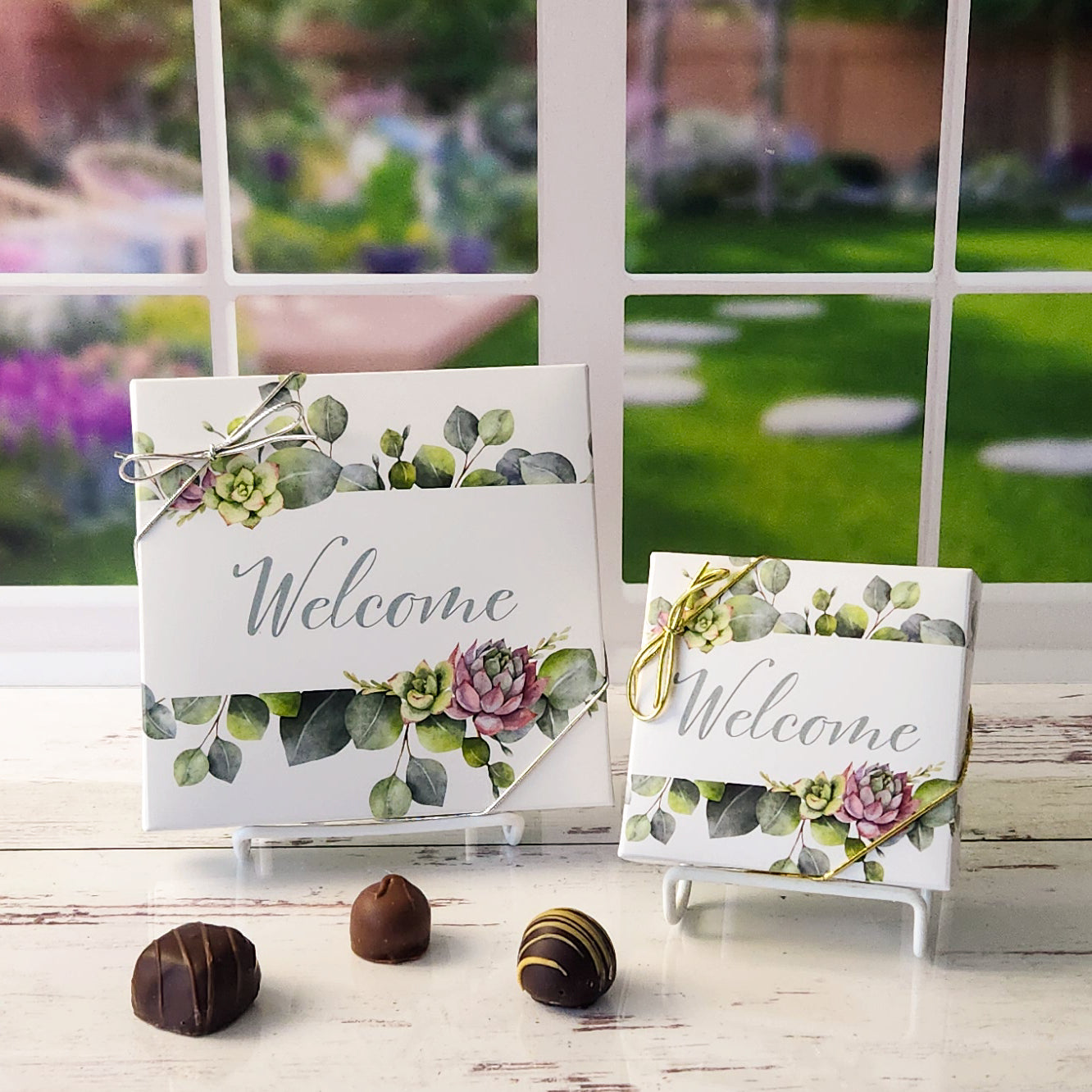 An assortment of our most popular milk and dark chocolate creams, caramels, melt-aways, and truffles all packed inside a elegant box printed with succulent plants and the word "Welcome".