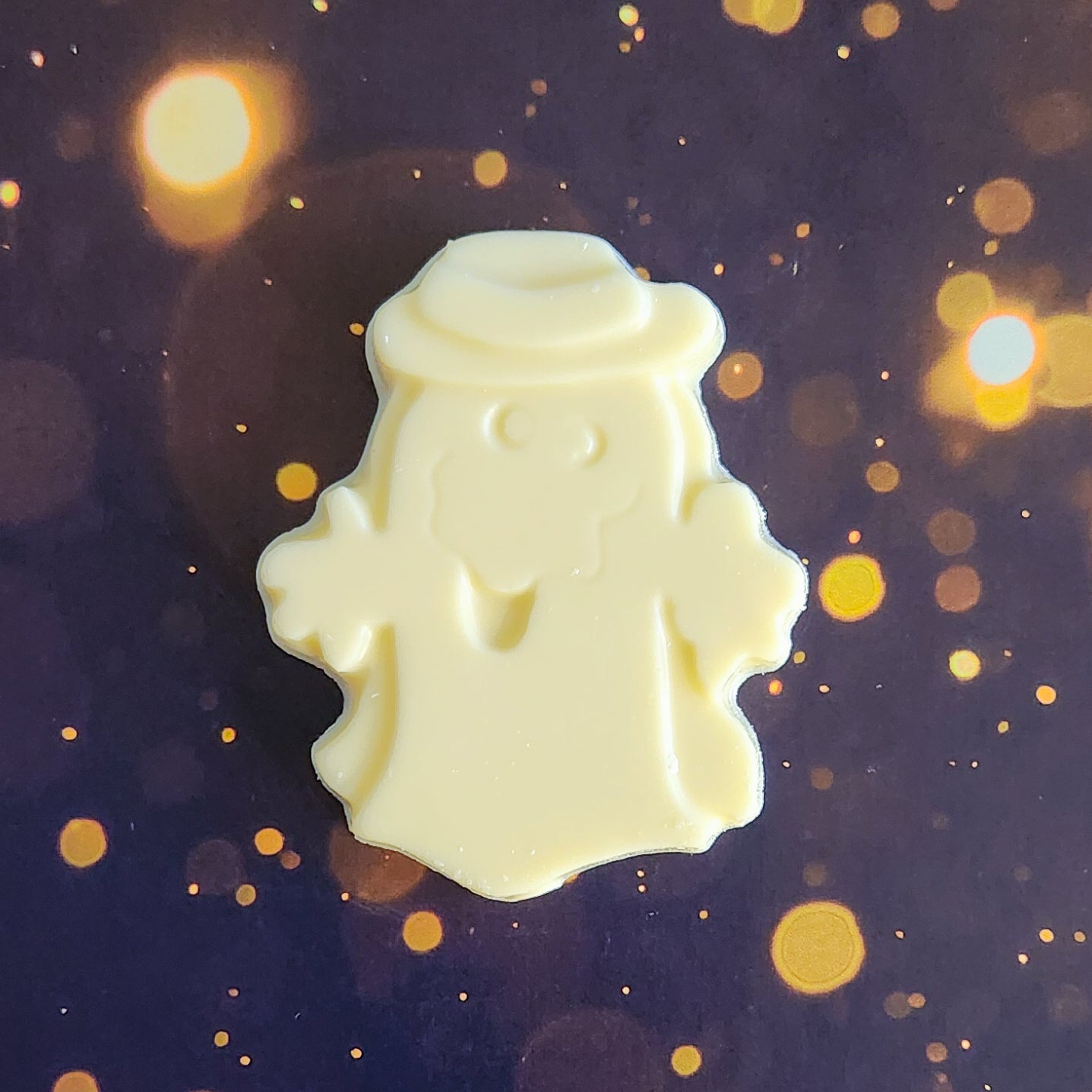 White Chocolate Ghost with hat Favor.  Measuring approximately 2.75 inches wide by 3.25 inches tall 