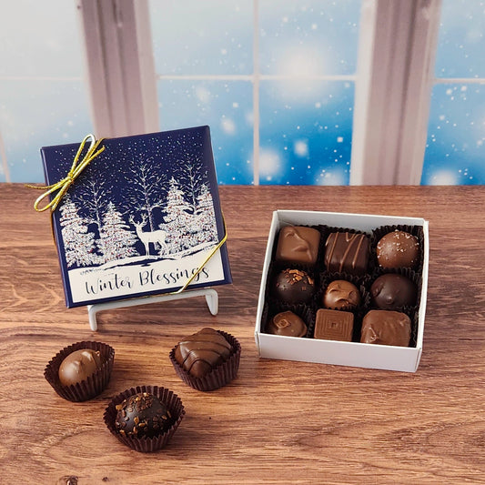 9 Piece Winter Blassings Chocolate Assortment.  Inside, you'll find a handpicked assortment of our most popular milk and dark chocolates. Think creamy centers, buttery caramels, dreamy melt-aways, and decadent truffles