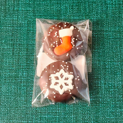 Indulge in the perfect holiday treat with our Winter Themed Chocolate Covered Oreo Cookies! These customer-favorite cookies are coated in rich dark chocolate and decorated with festive winter flair to celebrate the season. Packaged in a convenient two-pack, they’re perfect for sharing with a friend or savoring all on your own