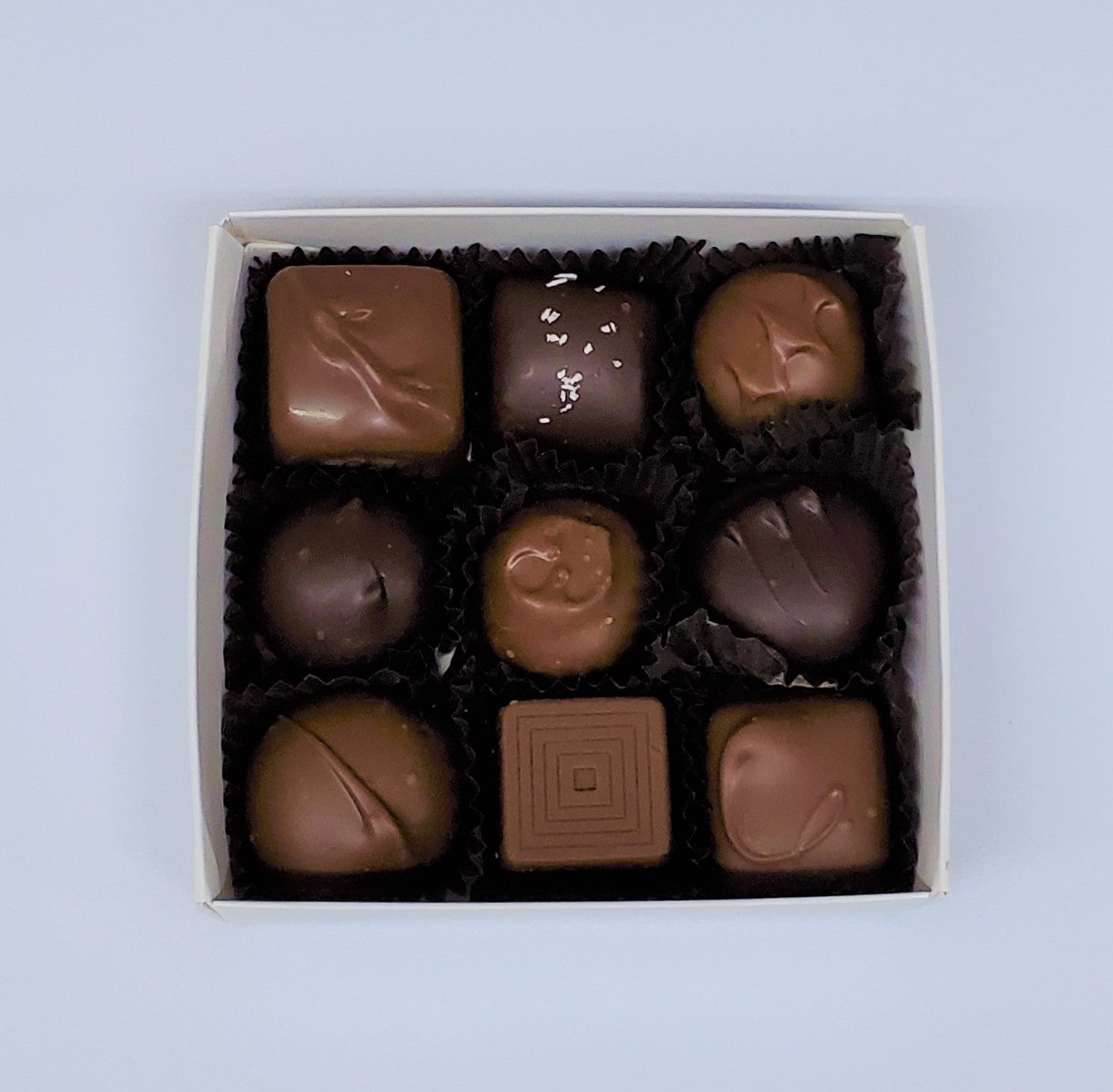 9 assorted creams, caramels and meltaways of our most popular hand made chocolates in a decorative box