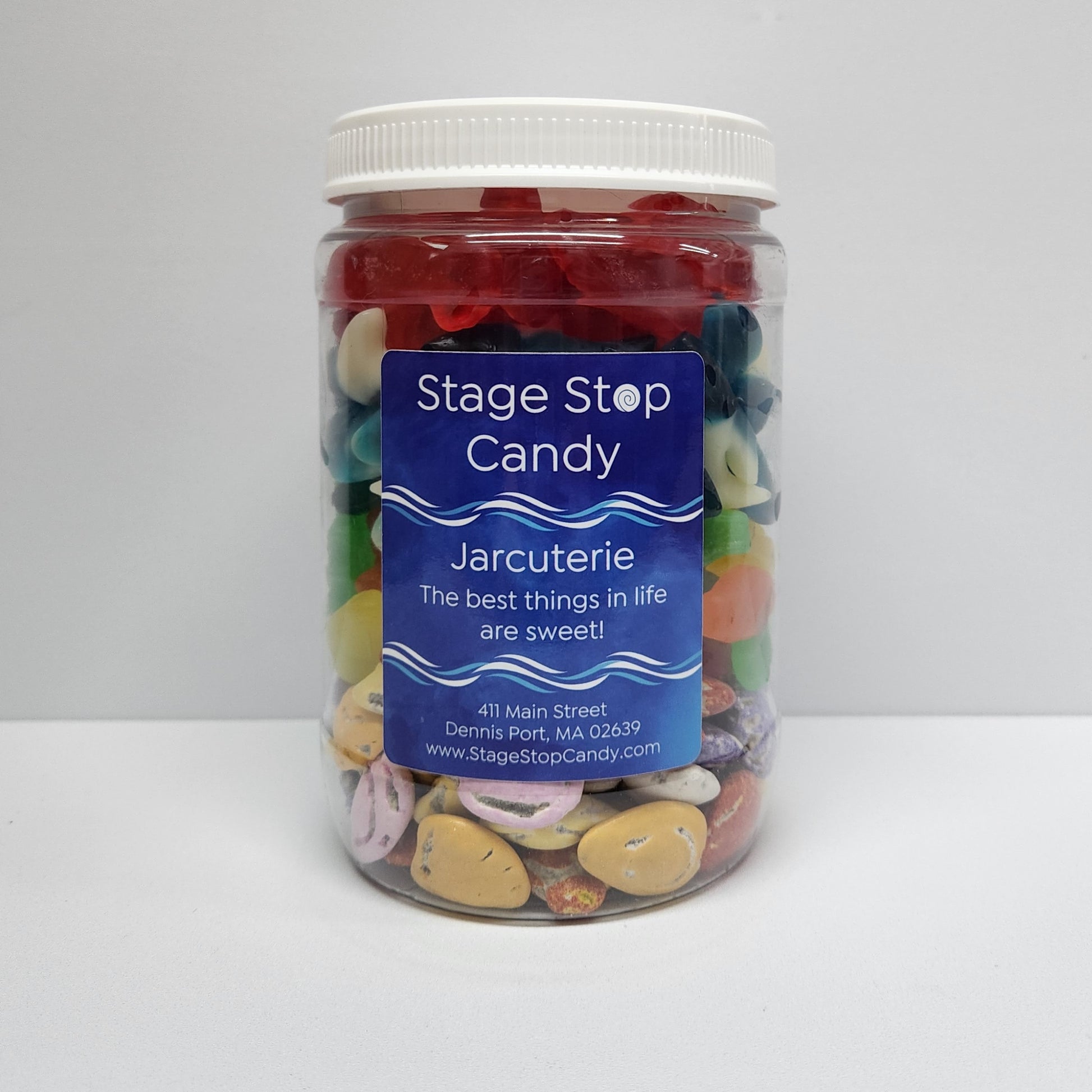 Stage Stop Candy's Beach Day Jarcuterie Jar features a layers of multi-colored milk chocolate sea shells, Gummi Fish, Gummi Sharks and Gummi Lobsters. 