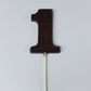 Dark Chocolate lollipop with the word 'Dad'