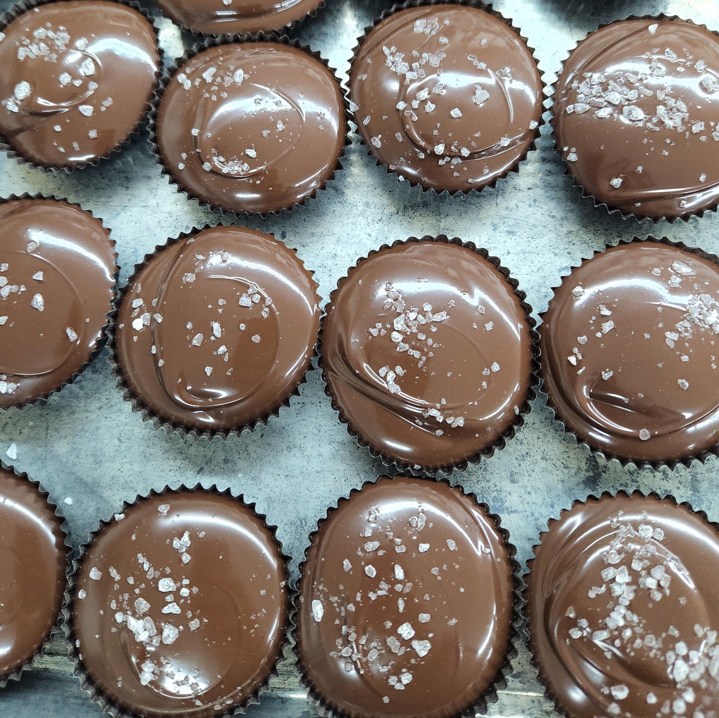 Finished tray of Milk Chocolate Sea Salt Caramel Cups made by Stage Stop Candy