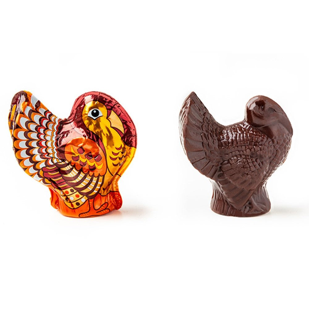Enjoy a detailed 3D milk chocolate turkey, individually wrapped in colorful foil. A delightful addition to your holiday table settings, each turkey weighs 1 oz