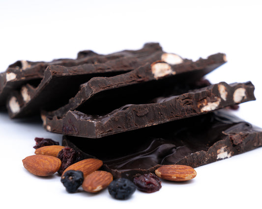 Closeup of high cocoa dark chocolate blueberry cranberry almond bark