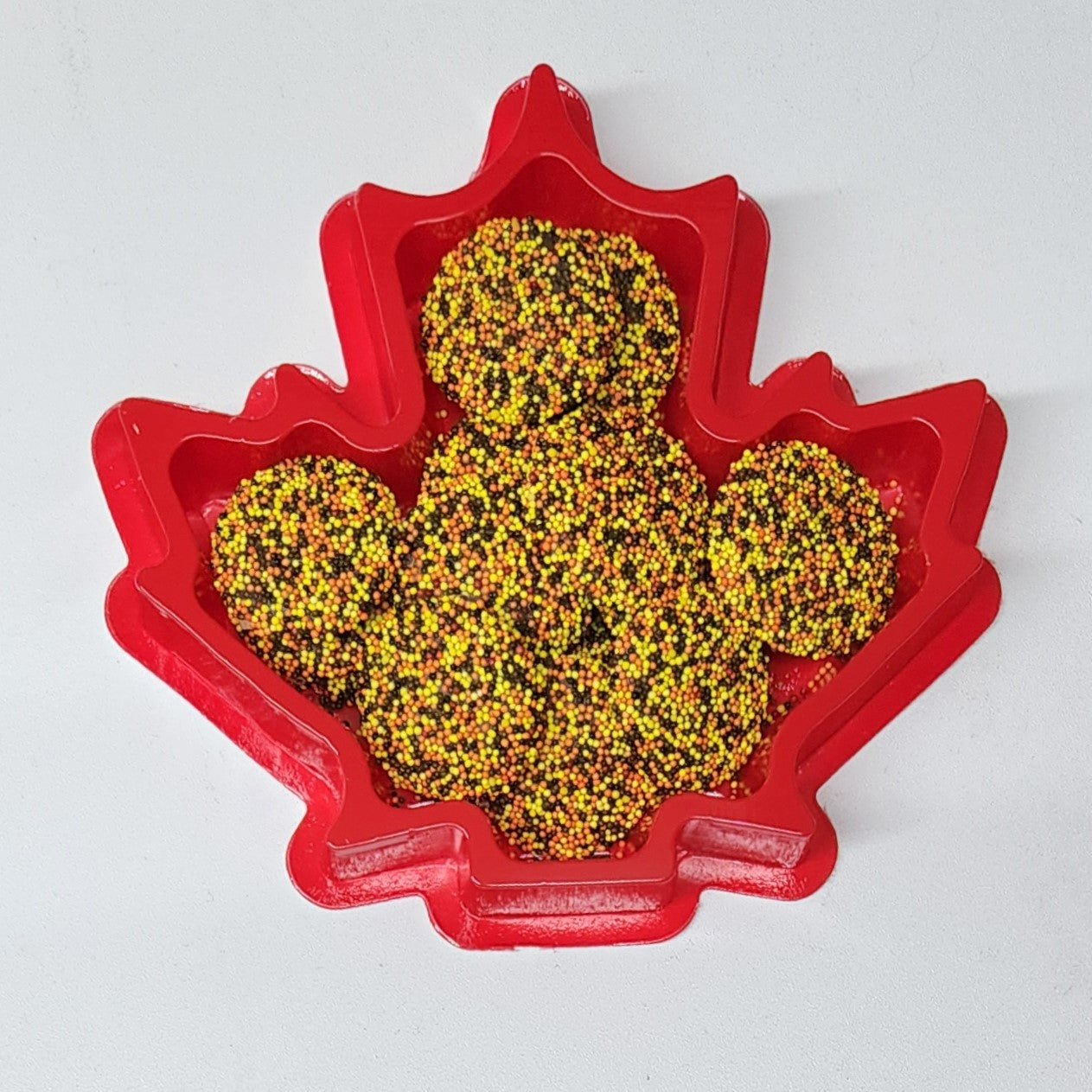 Fall-Colored Nonpareils in a Red Leaf Box