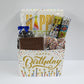 Happy Birthday Gift Basket includes foiled milk chocolate presents, milk chocolate nonpareils, dark chocolate-covered cranberries, milk chocolate birthday card and a 16-piece cream, caramels, meltaways, and truffle assortment