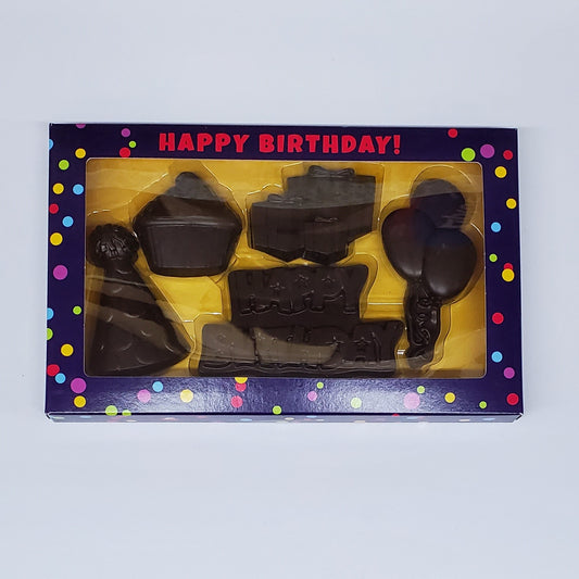 Dark Chocolate Happy Birthday Box Gift Set includes a party hat, cupcake, presents, balloons and Happy Birthday shaped chocolates