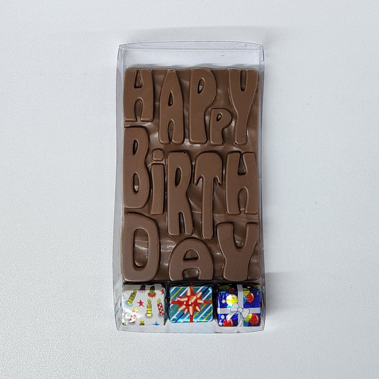 Solid milk chocolate Happy Birthday Bar with 3 foiled chocolate presents