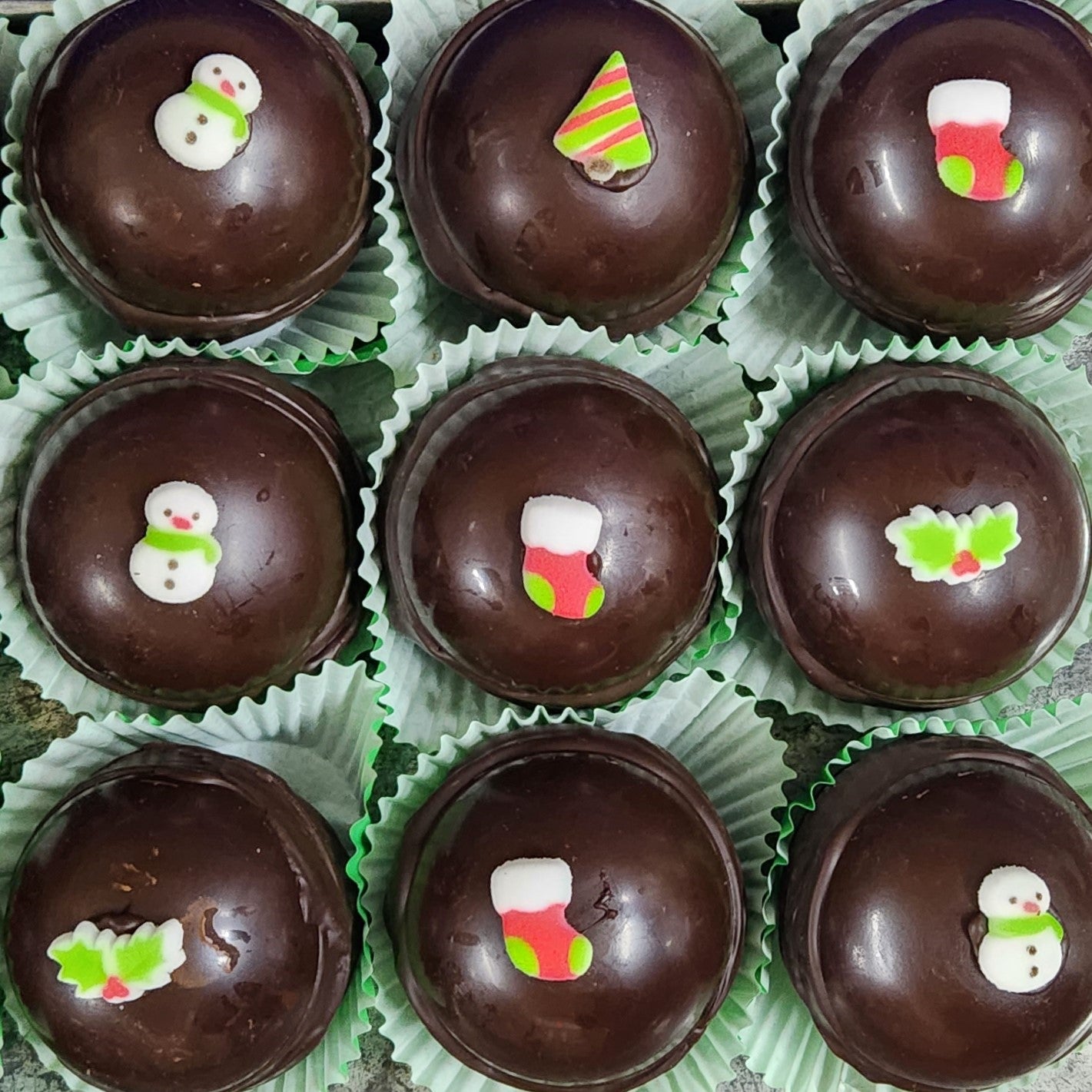 Dark chocolate holiday themed hot chocolate bombs