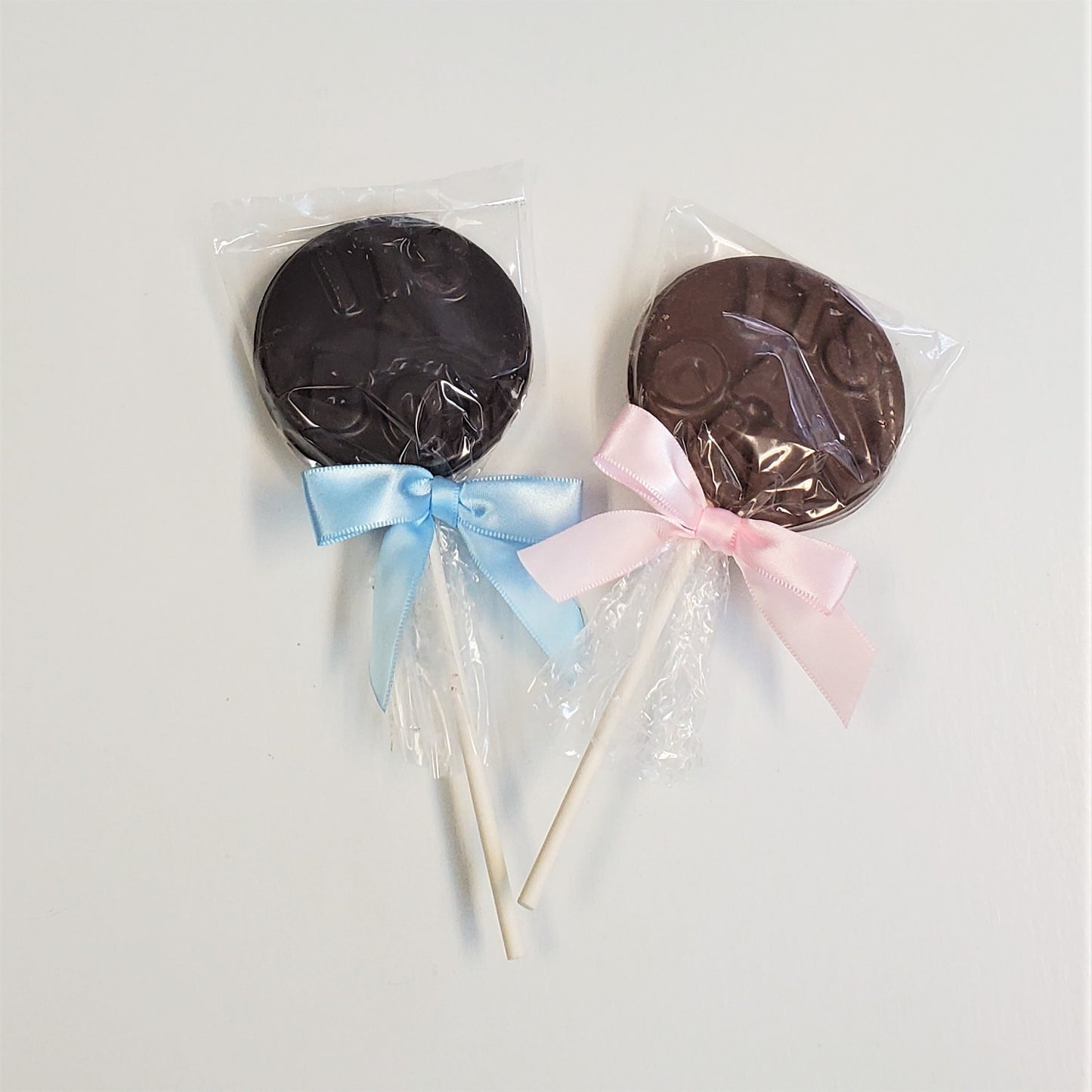 Milk and Dark Chocolate It's A Girl / It's a Boy Chocolate Medallions on a popsicle stick