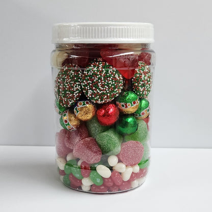 Jelly beans, foiled milk chocolate Christmas ornaments and jingle bells,  milk chocolate Christmas themed nonpareils and snowman and Christmas tree gummies. 