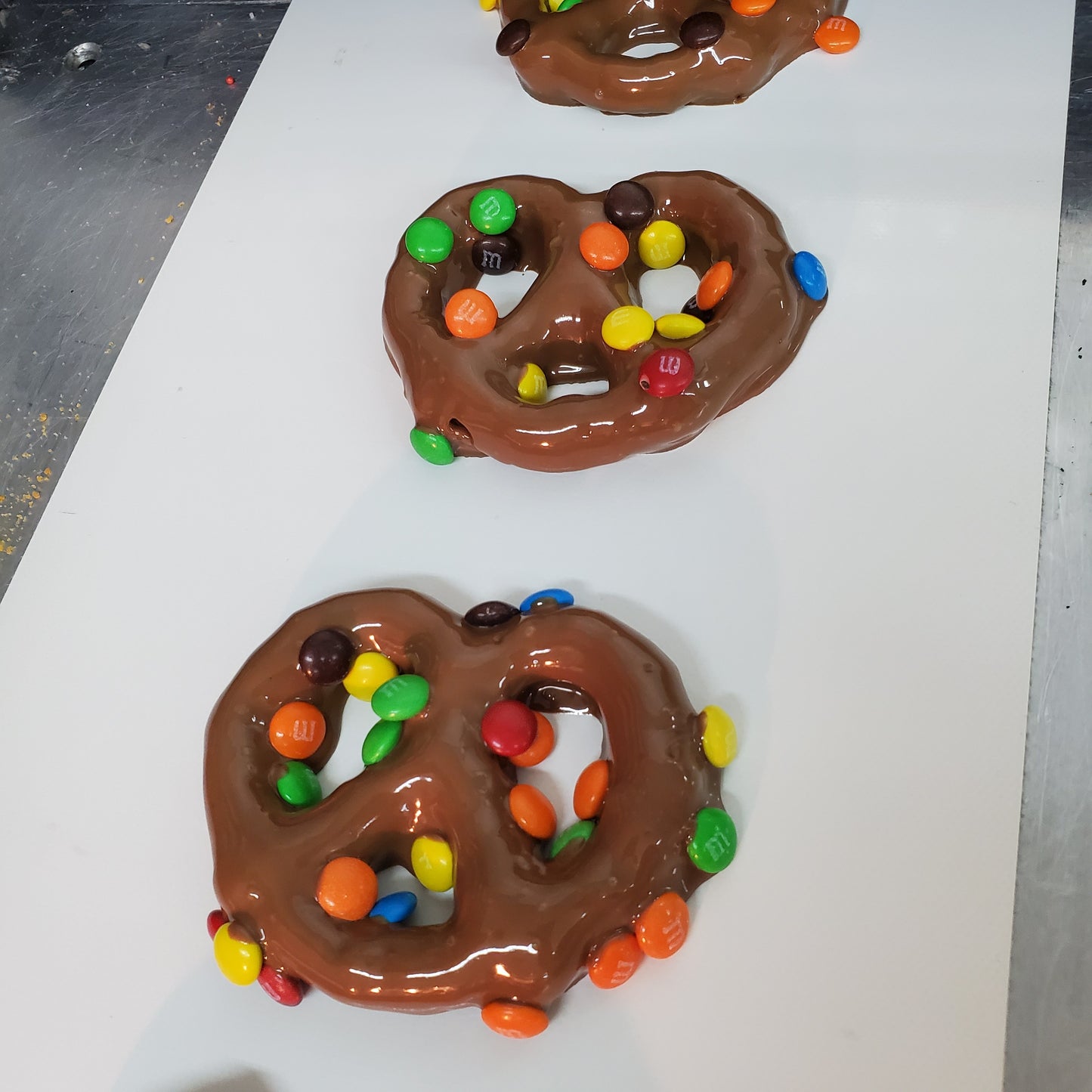 Making Pretzels Covered In Milk Chocolate With M&M's