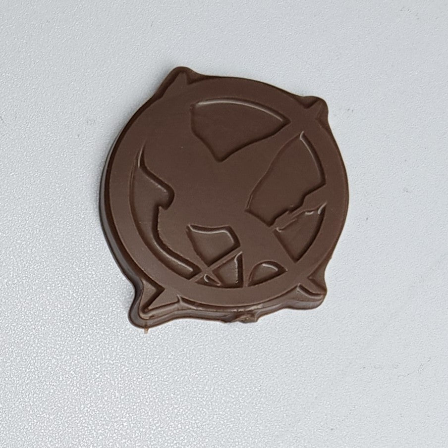 Solid Milk Chocolate Mockingjay logo from The Hunger Games