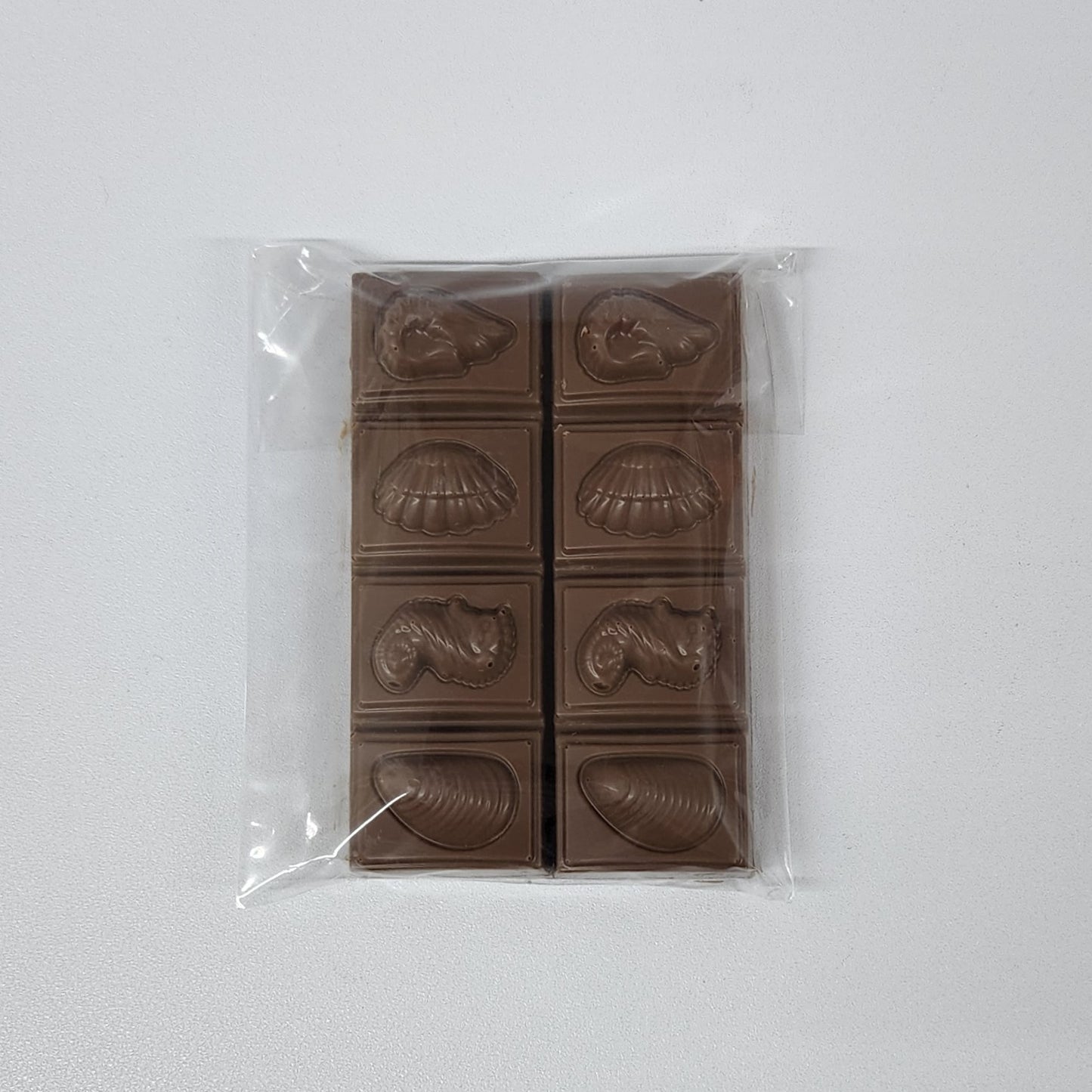 Milk chocolate bars imprinted with sea shells and sea creatures