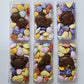 Multi-colored milk chocolate sea shells with solid milk chocolate sea creatures from Stage Stop Candy in Dennis, MA