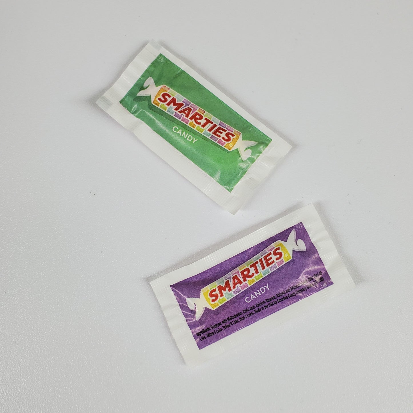 Small packages of Smarties containing 3 pieces of candy