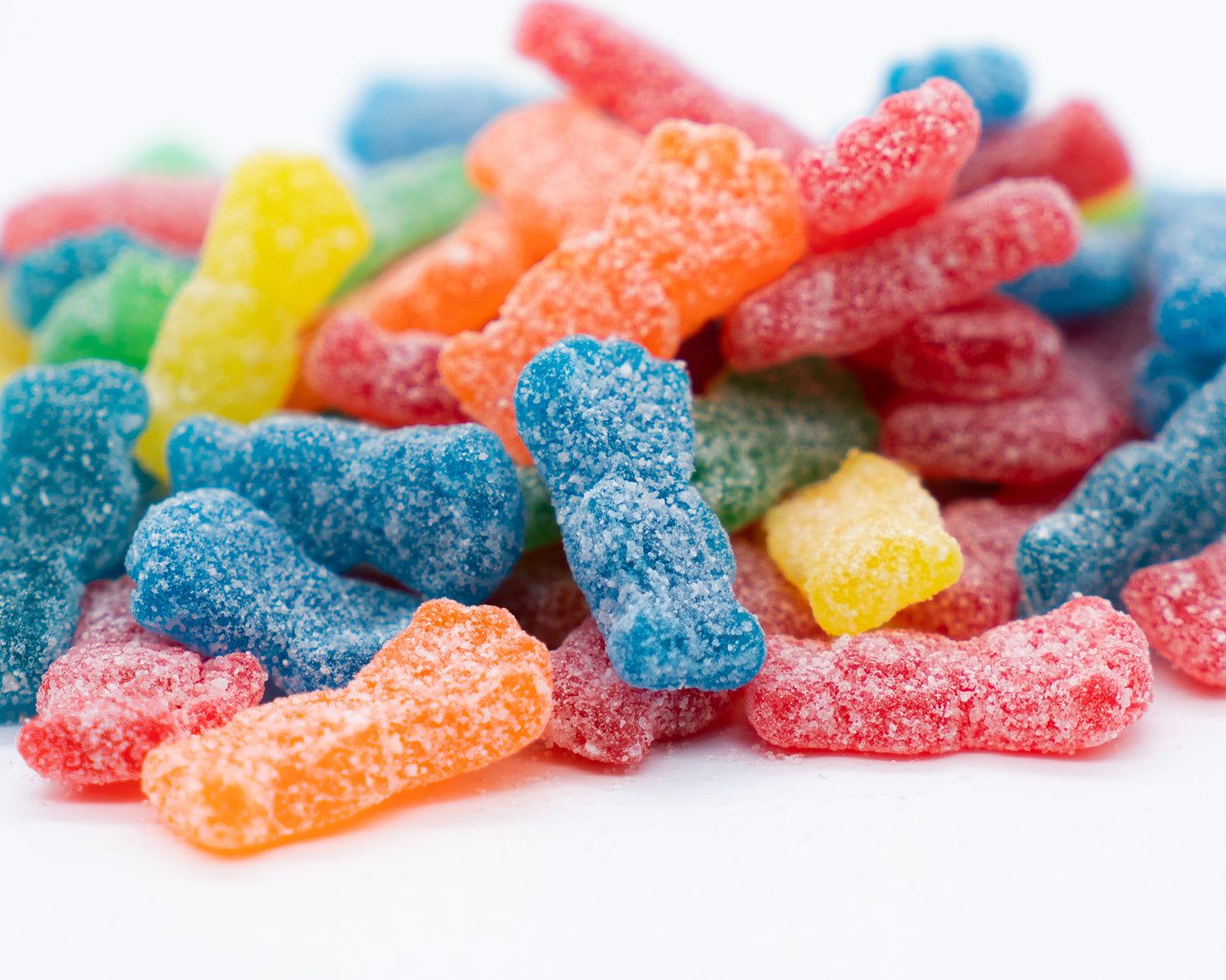 Red, Orange, Yellow, Green and Blue Sour Patch Kids Closeup