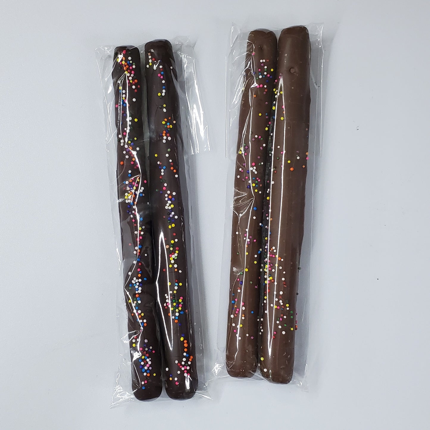 milk & dark chocolate sprinkle pretzel rods