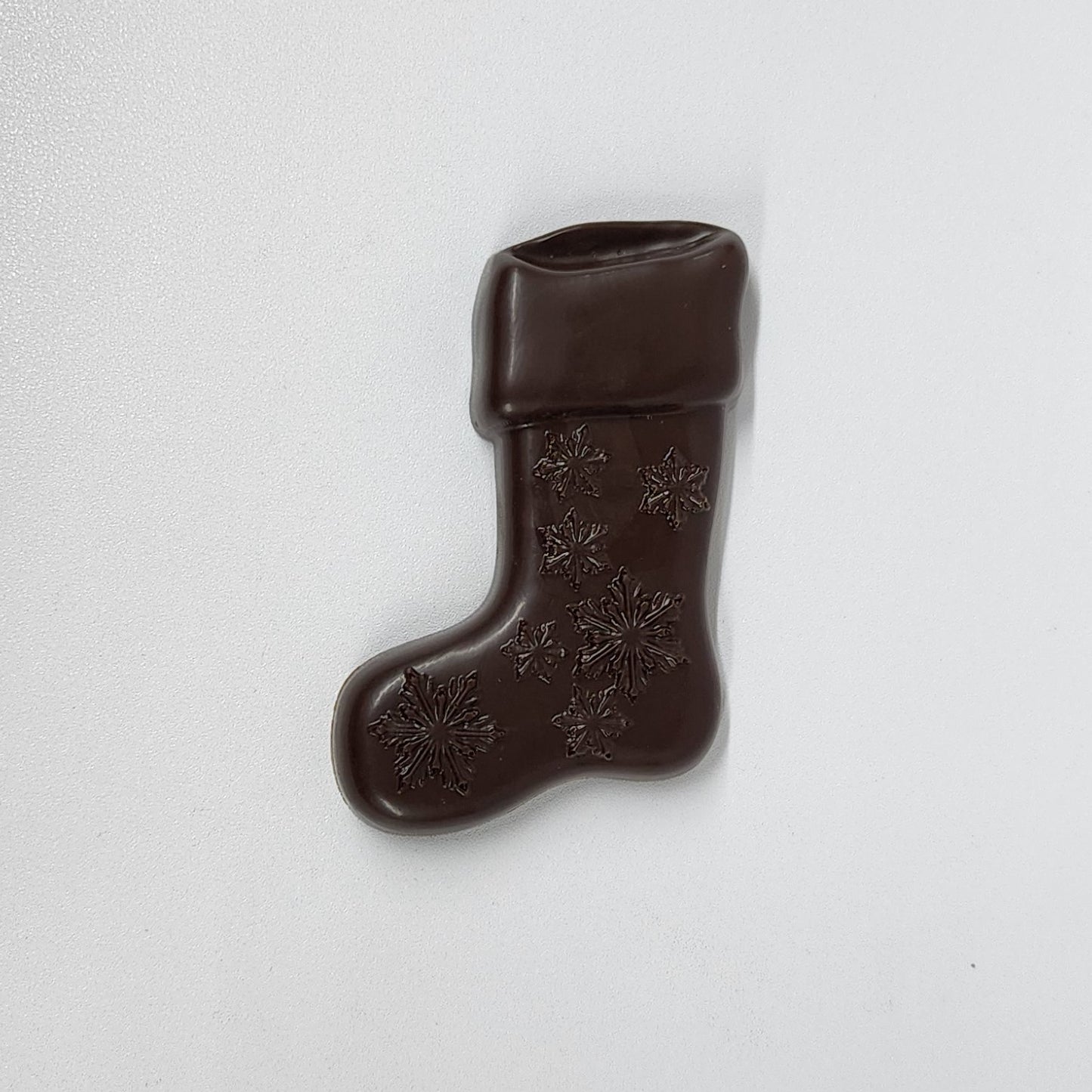 Solid dark chocolate stocking with snowflakes