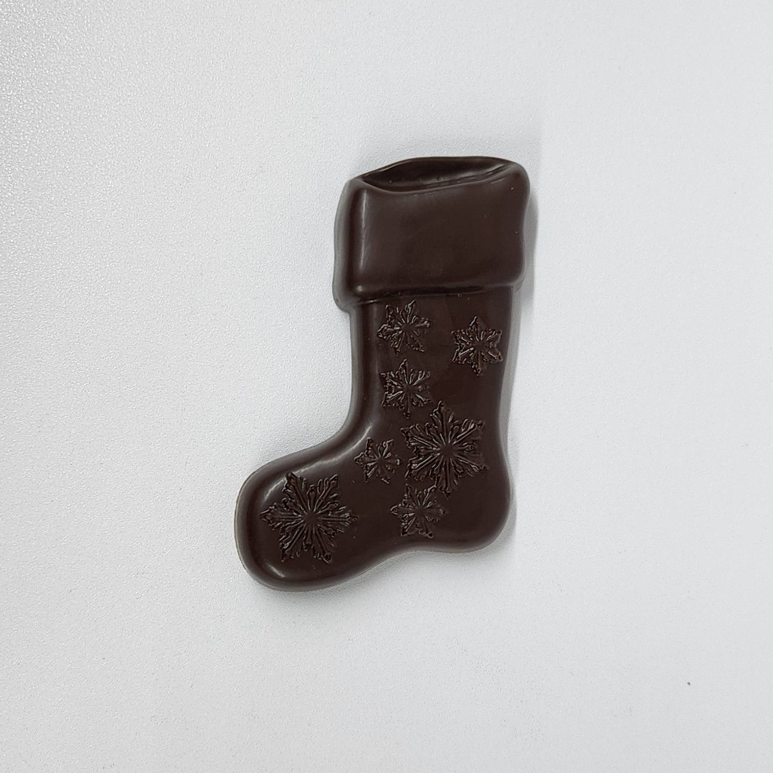 Solid dark chocolate stocking with snowflakes