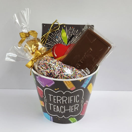 Teach Appreciation Gift Basket includes a 9 piece assortment of creams, caramels, meltaways, and truffles, plus Milk Chocolate Nonpareils and foiled Gold Star chocolates