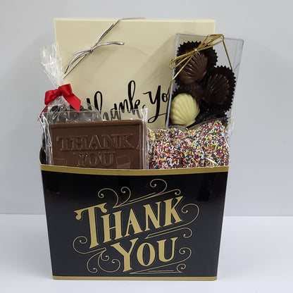 Saying "Thank You" is easy with this Stage Stop Candy Thank You Gift Basket featuring an assortment of house-made chocolate treats