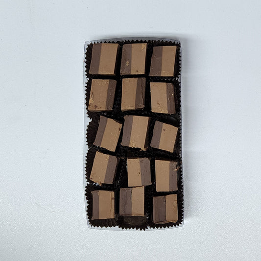 Two Layer Meltaways from Stage Stop Candy are a layer of milk chocolate and a layer of dark chocolate, infused with hazelnut